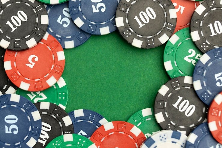 Live dealer at American Roulette table spinning the wheel during an active round